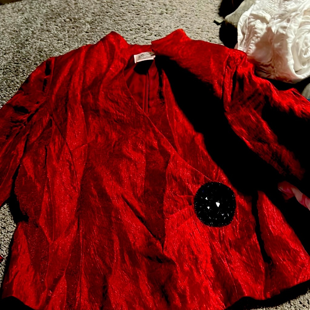 This classy shirt has everything you can even open it in the back if you want:)